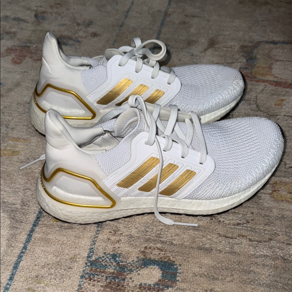Adidas Ultraboost 20 sneaker in the "White Gold Metallic" colorway